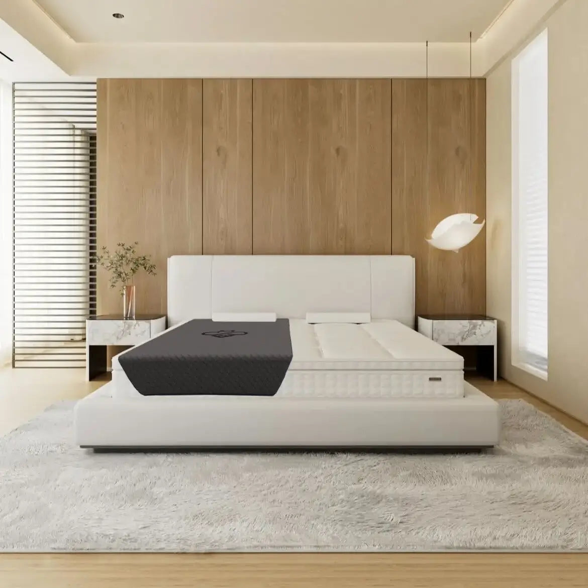 Hapbee Immersive Mattress Topper on a white bed in a modern bedroom setting.